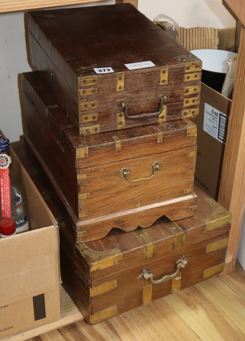 Three Eastern brass-bound boxes